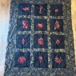 Black and Red Embroidered Quilt